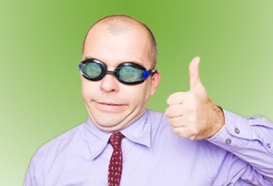 Crazy businessman showing thumb up